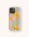 Introducing the Bubble Gum Eco-Friendly Phone Case—a smartphone cover adorned with overlapping pastel brushstroke patterns in pink, yellow, blue, and purple, finished with a small black horseshoe logo near the bottom center.