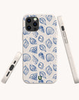 Three Sea Shells Eco-Friendly Phone Cases featuring a blue seashell pattern on a white background are displayed from different angles, showcasing the design and the precisely crafted cutouts for the camera, buttons, and ports.