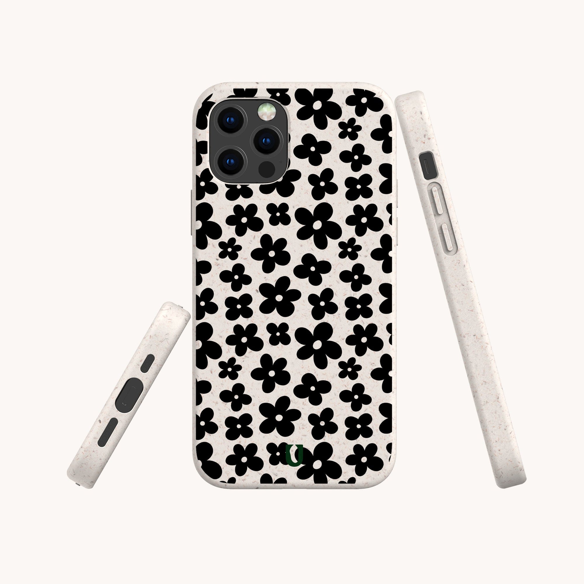 The Black Flower Power Eco-Friendly Phone Case in white showcases bold black floral patterns across the back, with views highlighting the phone case from the back, side, and bottom angles.