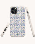Showcased from the back and sides against a light background, the Blue Flowers and Bow Ribbons Eco-Friendly Biodegradable Phone Case features a charming blue floral and bow pattern, with precise camera and button cutouts for easy access.