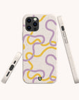 Three views of the Purple and Yellow Swirls Eco-Friendly Biodegradable Phone Case are shown, featuring artistic purple and yellow squiggly lines on a white, speckled surface with a camera cutout. The case is displayed from the front, side, and bottom angles against a light background.