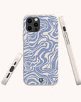 The Blue Marble Swirl Eco-Friendly Phone Case is shown from the back, side, and bottom, displaying its blue and white marbled design, precise cutouts, and a small green and black logo on the back.