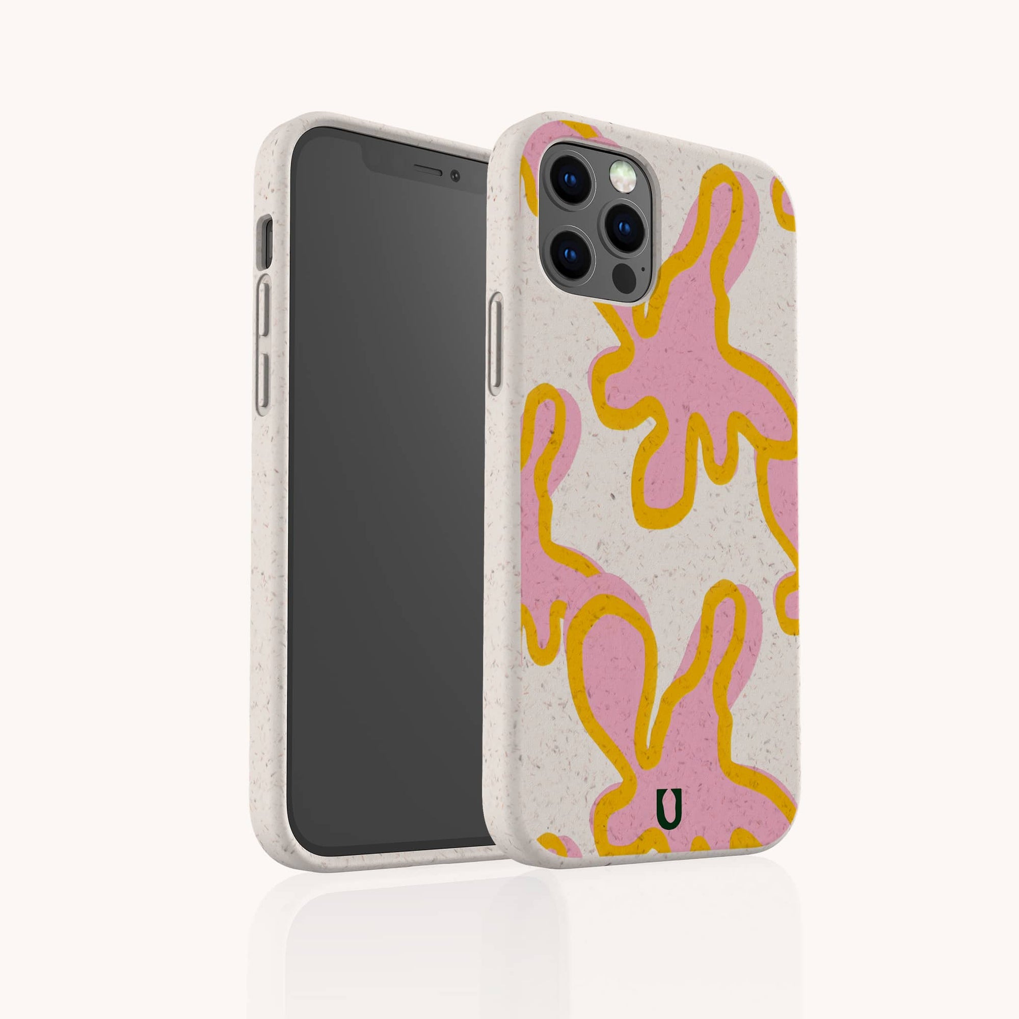 The Pink Abstract Flowers Eco-Friendly Phone Case is made from biodegradable, climate-positive materials and features pink and yellow abstract flower designs on a speckled beige background, shown covering a smartphone with dual camera lenses.