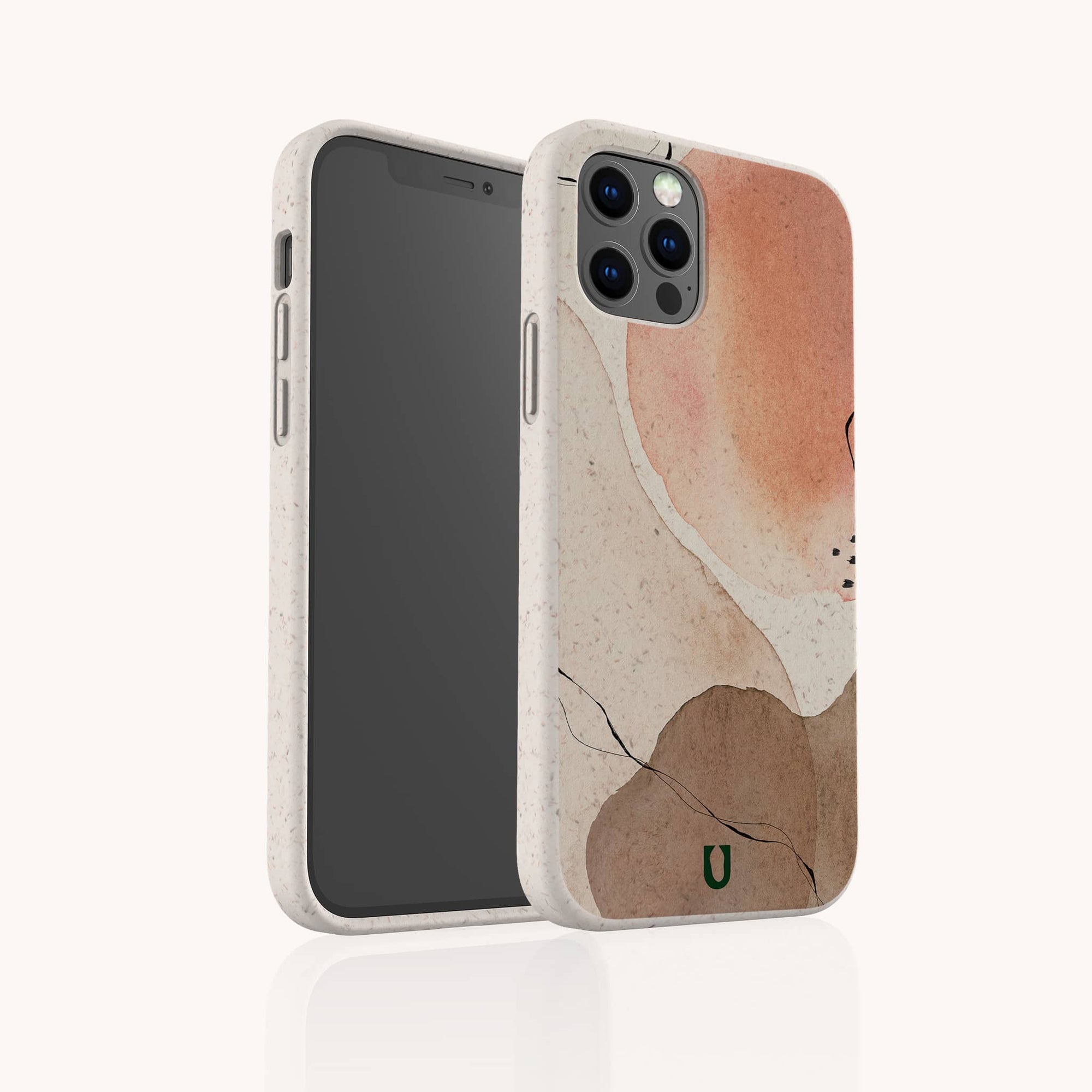 The Pink and Brown Watercolour Eco-Friendly Phone Case features abstract watercolor designs in peach, brown, and cream tones with subtle black lines and a small green "U" logo at the bottom.