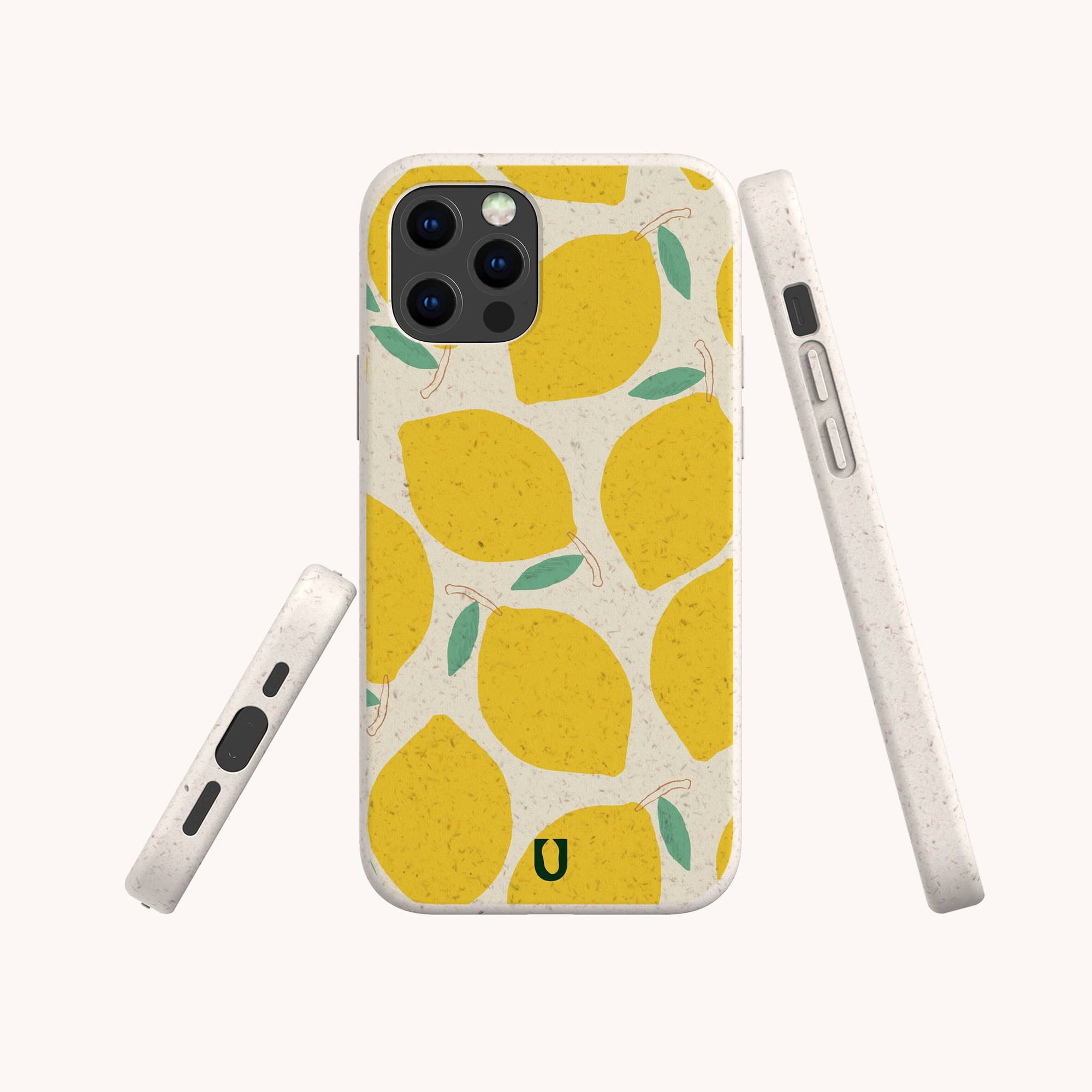 The Lemons Eco-Friendly Phone Case features a citrus pattern with yellow lemons and green leaves on a cream background, shown from the back and sides to highlight the design, button placements, and compostable materials.