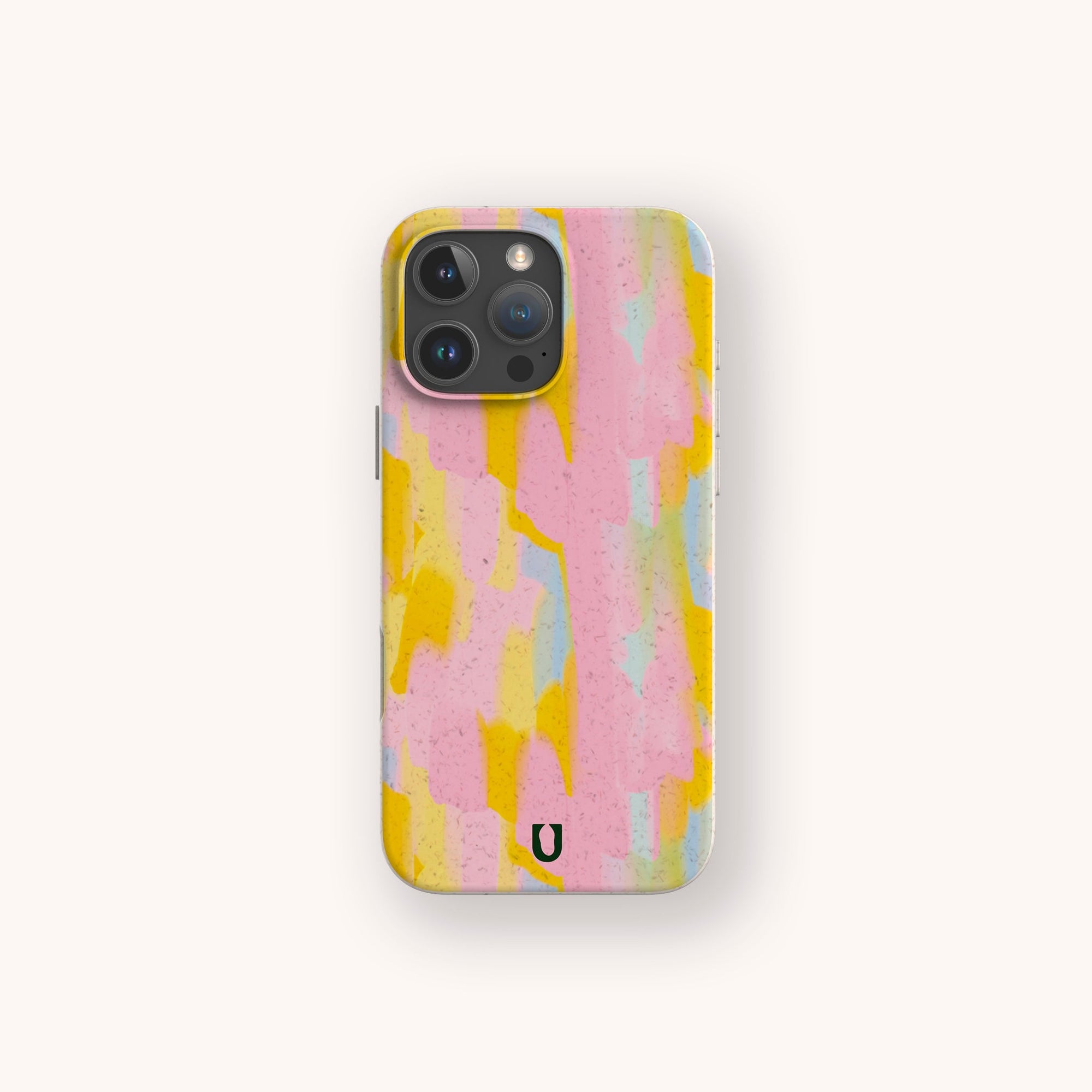 The Mango Sorbet Eco-Friendly Phone Case features an abstract pattern in pink, yellow, blue, and white brushstrokes with a small horseshoe-shaped logo at the bottom center. Compatible with iPhone and Samsung Galaxy models.