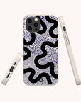 Three views of the Speckled Swirl Eco-Friendly Biodegradable Phone Case, featuring a black wavy line and blue dot pattern on a white background, displayed from the back, side, and angled edge on a plain off-white backdrop.
