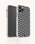 The Black Flower Checker Eco-Friendly Phone Case features a black and white checker design with small floral patterns, displayed from the front and back against a plain light background.