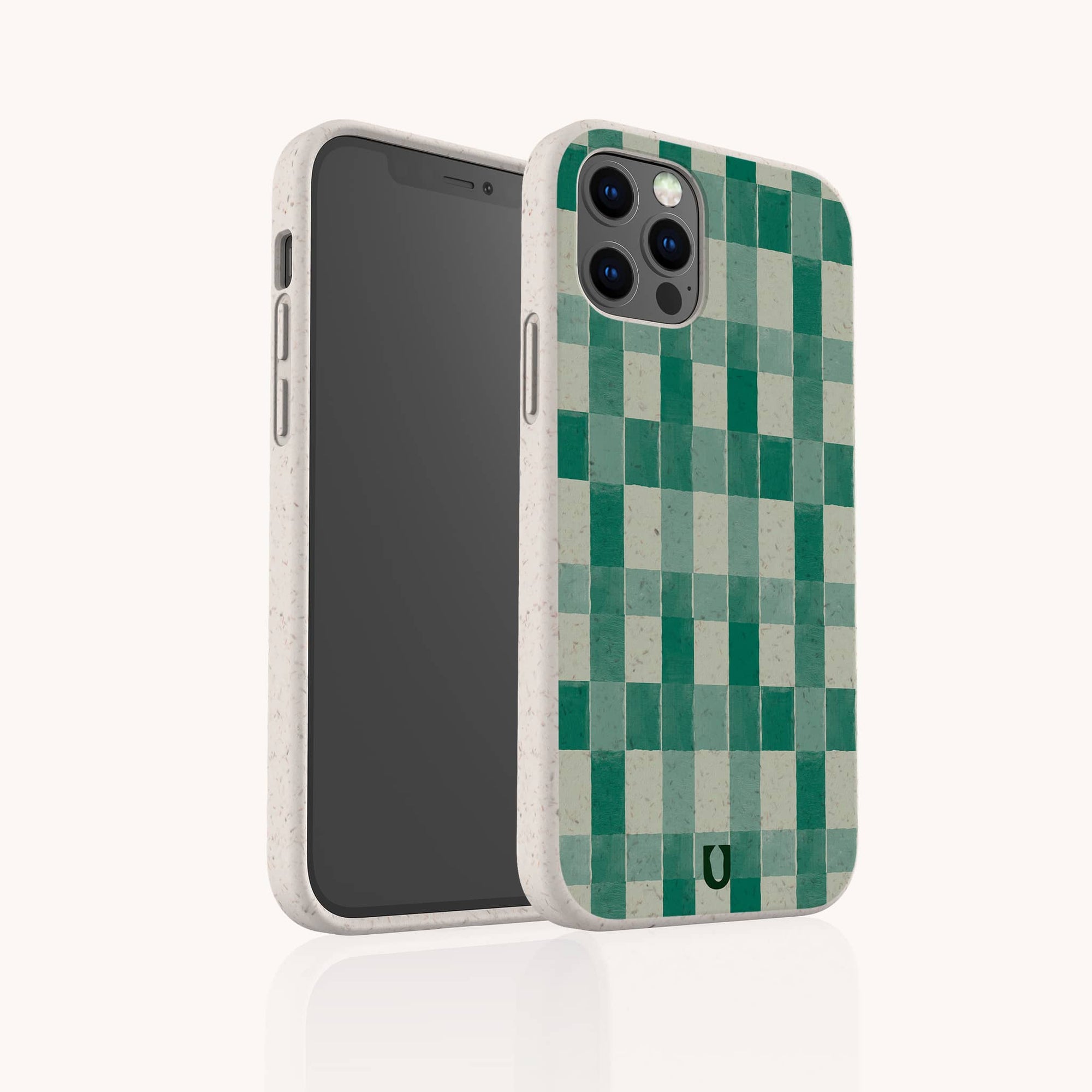 The Green Watercolour Checker Eco-Friendly Phone Case, made from biodegradable materials, features a green checkered design and protects your iPhone or Samsung Galaxy while displayed upright on a white background.