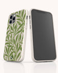 Two smartphones featuring the Willow Eco-Friendly Phone Case in white—one case displays a green, leafy plant pattern on the back, while the other highlights a blank screen and visible side buttons. Both iPhone and Samsung Galaxy versions of the Willow case showcase a subtle speckled texture with a small logo near the bottom.