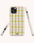 The Pastel Checker Biodegradable Eco-Friendly Phone Case is shown from three different angles, highlighting its textured surface and button features against a light background. This sustainable phone case blends eco-friendly materials with a pastel pink, yellow, and green plaid checker design for a cheerful yet responsible accessory choice.
