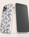 Two smartphones in eco-friendly speckled cases—crafted from sustainable materials—feature the Turtles Eco-Friendly Phone Case. One showcases a vibrant blue sea turtle design, while the other displays a blank black screen. Both cases have a natural, sustainable look.