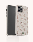 A smartphone is displayed upright against a plain light background, featuring both the front screen and the back design of the White Paper Planes Eco-Friendly Biodegradable Phone Case in beige with a brown paper airplane pattern.