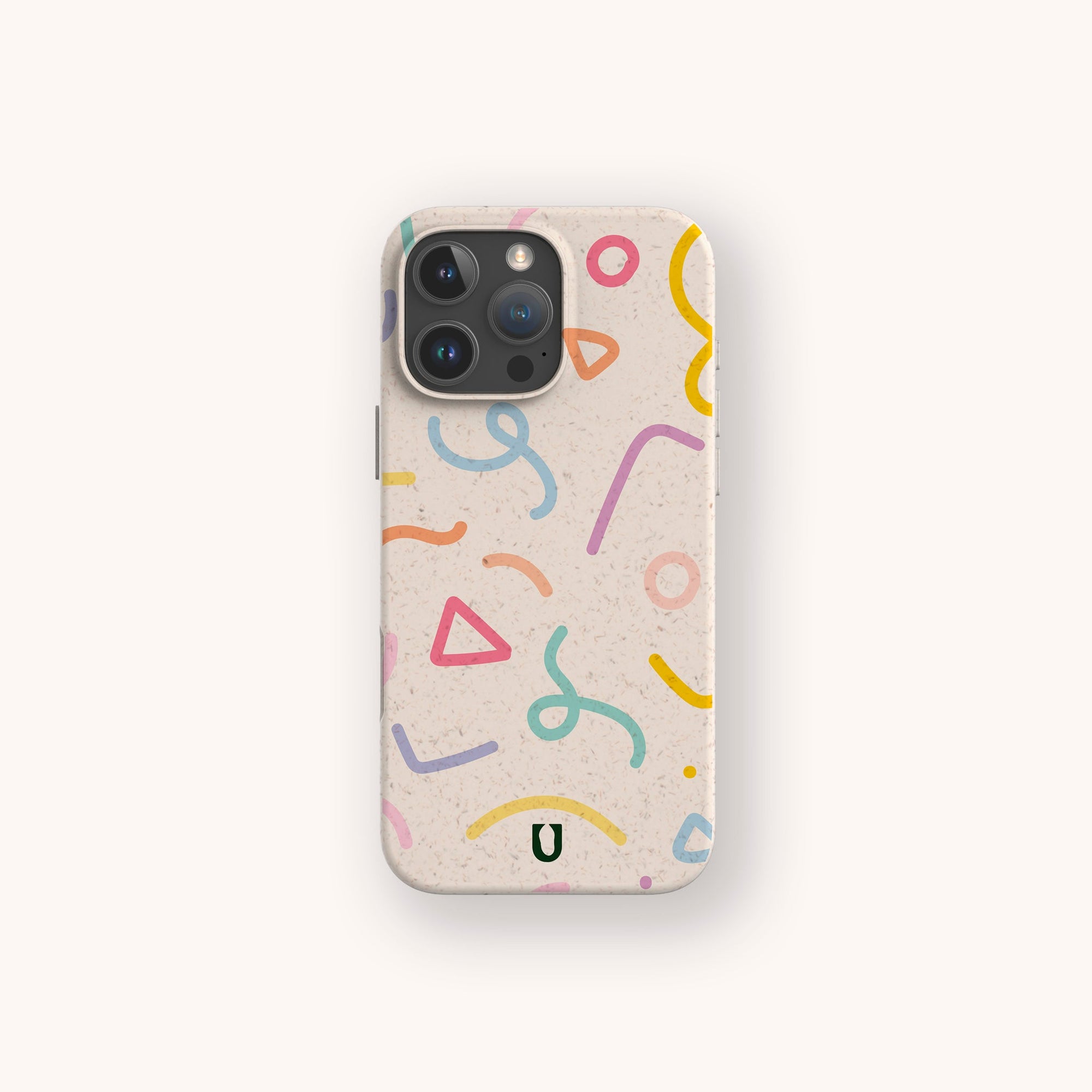 The Confetti Eco-Friendly Phone Case features colorful abstract shapes and squiggles in pink, yellow, blue, orange, and green on beige, with a black "U" logo. Compatible with iPhone and Samsung Galaxy models.