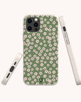 The Vintage Green Flowers Eco-Friendly Phone Case showcases a charming green background with a delicate pink and white floral pattern, displayed from the back, side, and angled views against a simple light backdrop.