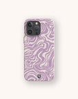A Purple Marble Swirl Eco-Friendly Phone Case, featuring a lavender and white wavy abstract pattern and a small black horseshoe-shaped logo at the bottom, is centered on a light background.