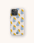 A phone with the Pears Biodegradable Eco-Friendly Phone Case, featuring a pattern of blue and yellow abstract shapes on a white background. This sustainable case includes a small green U logo at the bottom center.