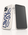 Two smartphones with off-white, speckled cases made from sustainable materials are shown. The left case is the Blue Bow Ribbon Eco-Friendly Phone Case featuring a blue abstract line design; both cases fit iPhone and Samsung Galaxy devices.