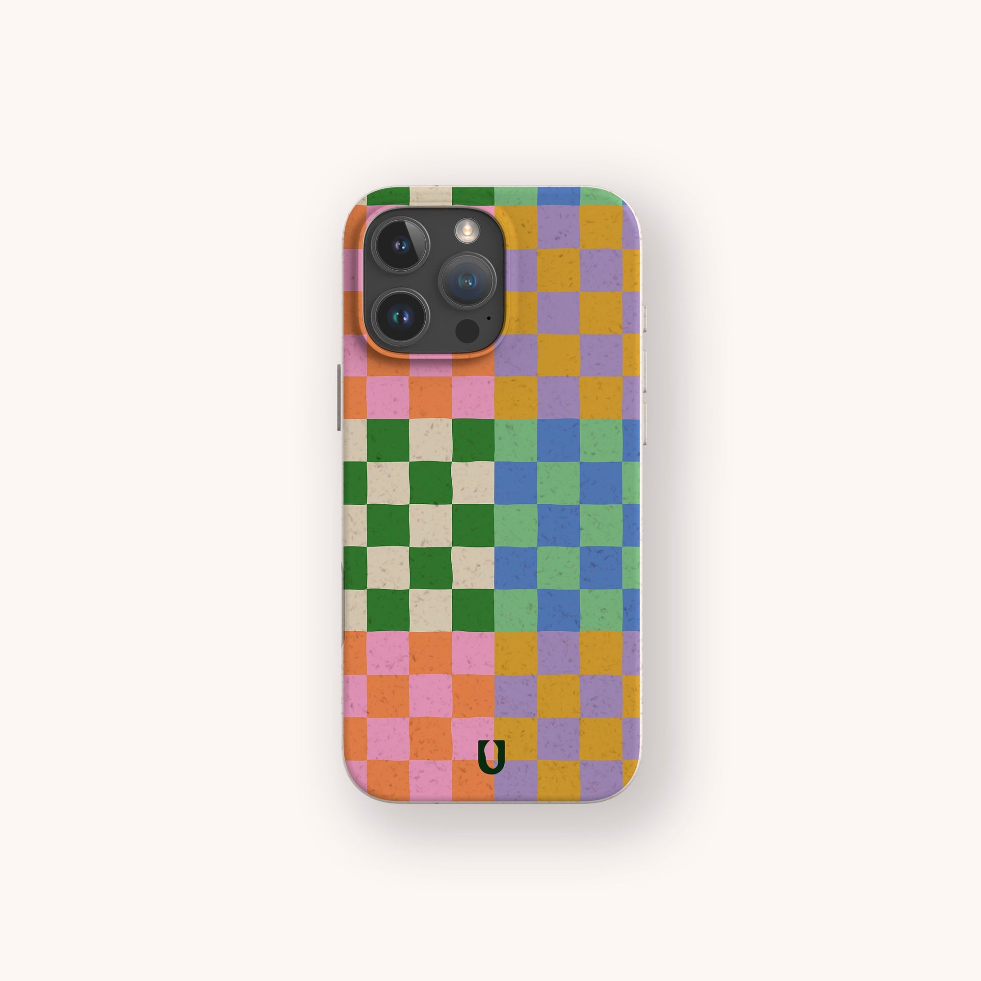 The Colour Checker Eco-Friendly Phone Case features pink, orange, green, blue, and purple squares with a small black horseshoe near the bottom center. Stylish iPhone compatible protection.