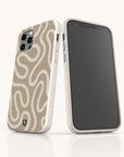 Two smartphones in beige Neutral Swirl Lines Eco-Friendly Phone Cases with white squiggly line patterns. One phone faces forward, displaying the screen, while the other shows the patterned back and triple camera setup. Both cases—available for iPhone and Samsung Galaxy—feature a small green logo at the bottom, emphasizing their eco-friendly design.