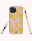 Three views of the Peach Sorbet Eco-Friendly Phone Case, made from biodegradable materials with a pastel pink, yellow, and green abstract design. Shown on a smartphone (back, side, bottom); compatible with iPhone and Samsung Galaxy.