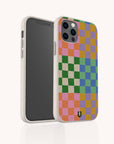 The Colour Checker Eco-Friendly Phone Case for iPhone is white with a colorful checkerboard pattern in pink, orange, yellow, green, blue, and purple speckles. Both front and back angles are displayed.