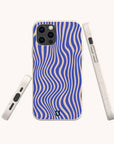 The Cobalt Distort Lines Eco-Friendly Phone Case features blue and cream wavy stripes, displayed from the back, side, and angle against a light background.
