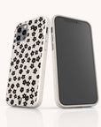 Two Little Black Flowers Eco-Friendly Biodegradable Phone Cases, each in a white finish adorned with an elegant black floral pattern, are displayed upright from both back and front angles against a simple, light backdrop. Crafted from sustainable materials, these cases offer a stylish design you can feel good about.