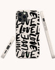 A Love Words Eco-Friendly Biodegradable Phone Case in white, featuring bold black “LOVE” text repeated in various sizes and angles, is displayed from the front, back, and sides against a plain background.