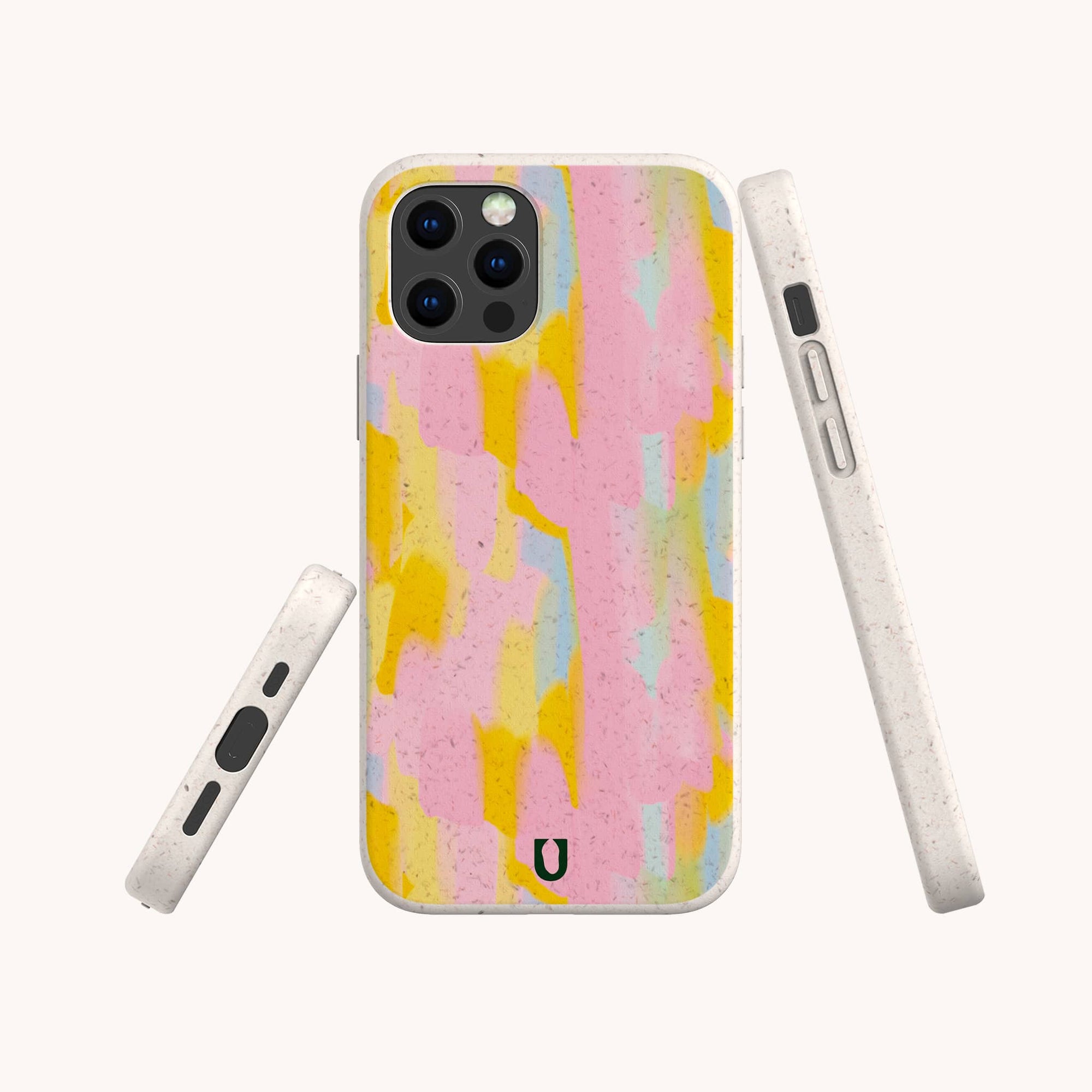 The Mango Sorbet Eco-Friendly Phone Case features a pastel abstract design in pink, yellow, and light blue with a white speckled border and a small horseshoe-shaped logo. Made from biodegradable materials, it's shown from multiple angles.