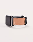 Displayed on a white background is the Abstract Cut Out Vegan Leather Apple Watch Band, featuring a rectangular black screen and a cruelty-free faux leather strap. The watch face is turned off, highlighting the sleek design and elegant band.