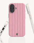 The Blush Wave Stripe Eco-Friendly Biodegradable Phone Case shown from the back and both sides, featuring a pink background with wavy vertical stripes.