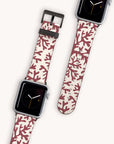 Two smartwatches with silver cases and eco-friendly Brown Coral Vegan Leather straps, featuring a red and white coral design. The Apple Watch Band displays show a simple black clock face with minimalist hands and a number nine marker.