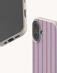 Two Lavender Pinstripe Eco-Friendly Biodegradable Phone Cases: one shown from the back with a lavender and orange pinstripe pattern, and one shown from the front with a light, bamboo fibre speckled texture.