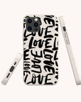 Close-up of Love Words eco-friendly phone case on iPhone 15 showing hand-lettered typography and soft matte surface.