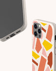 Paper Scraps biodegradable phone case displayed on Samsung Galaxy S24 with creative layered pattern and sustainable matte surface.