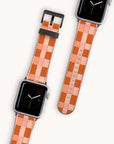Two Apple Watches feature square faces with black screens and minimalist clock hands. They sport Terracotta Watercolour Checker Vegan Leather bands showing a checkered pattern in terracotta and peach on a white backdrop, adding an eco-friendly touch to your style.
