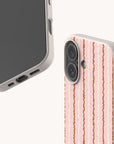 Two views of the Pink Squiggle Stripe Eco-Friendly Biodegradable Phone Case, featuring a pattern of vertical pink and white squiggle stripes on a speckled, off-white base.