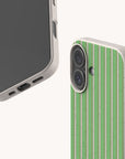Two views of the Sage Pinstripe Eco-Friendly Biodegradable Phone Case featuring a green and white pinstripe pattern on a speckled, light-colored base.