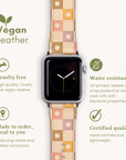 A Star Pink Check Vegan Leather Apple Watch Band, characterized by its pastel, floral pattern and crafted from vegan leather. It is cruelty-free and water-resistant with a protective satin coat. The band offers customizable options while emphasizing quality and sustainability, displayed on the smartwatch showing 9:00.