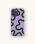 Purple and Green Swirl biodegradable phone case on iPhone 17 featuring colourful swirling pattern and matte eco-friendly finish.