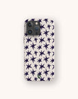 Wonky Stars biodegradable phone case on iPhone 17 with playful star pattern and eco-friendly matte finish.