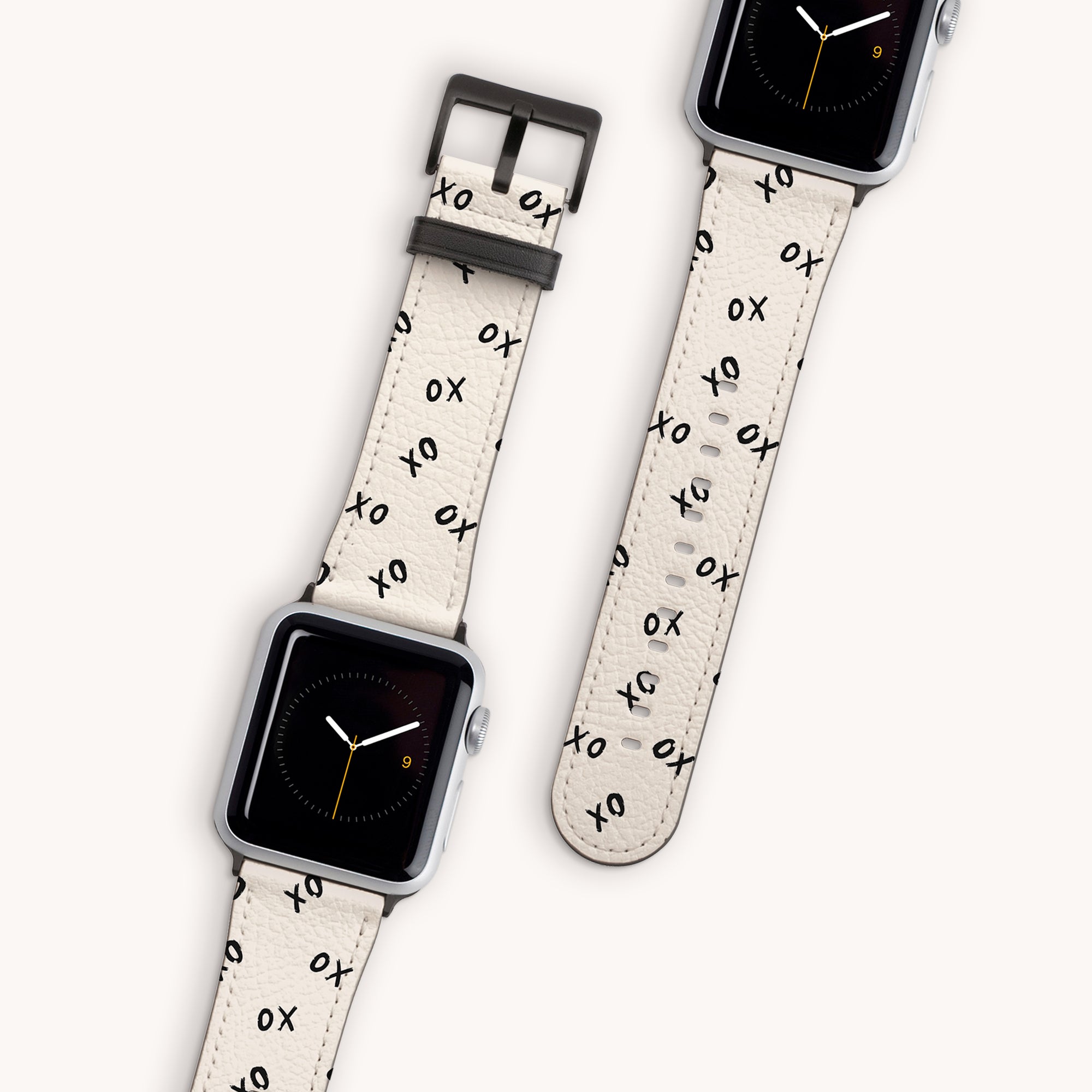 The Xo Xo Vegan Leather Apple Watch Band has a sustainable strap with "XO" patterns, eco-conscious crafting, and a minimalistic analog clock face. It's shown attached to the watch and separately on a light background.