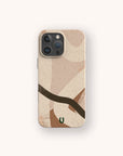 The Beige Abstract Eco-Friendly Phone Case, featuring a minimalist design with beige and brown abstract patterns, curved lines, and textured details, is displayed against a light background.