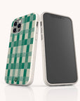 Two Green Watercolour Checker Eco-Friendly Phone Cases, made from biodegradable materials, are shown with a speckled off-white border. One displays the checkered back, the other the front screen; compatible with iPhone and Samsung Galaxy.