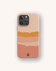 The Valleys Eco-Friendly Phone Case, compatible with iPhone and Samsung Galaxy, comes in beige, peach, and orange wave patterns. It is compostable and features a small black horseshoe logo at the bottom center.