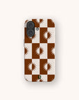 Phone case with brown and white checkered pattern on a white background