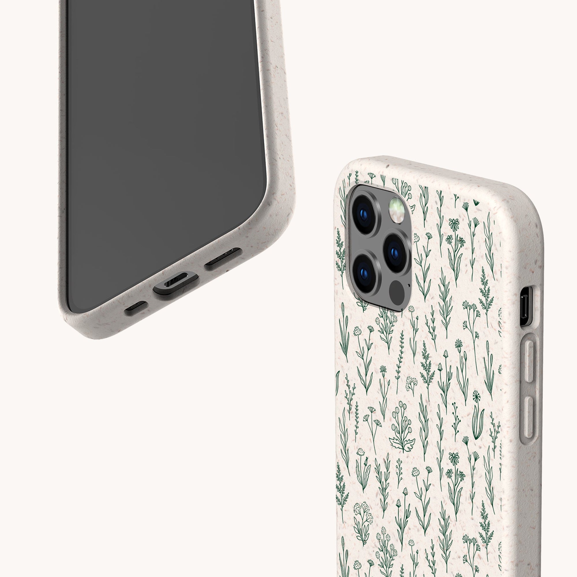 Two smartphones in light cases: one displays the Green Wild Flowers Eco-Friendly Phone Case with a minimalist green botanical design made from biodegradable materials; both cases fit iPhone and Samsung Galaxy models.