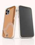 Two smartphones with beige cases are displayed—one reveals the front screen, while the other showcases the back of the Terracotta Abstract Strokes Eco-Friendly Biodegradable Phone Case, featuring an abstract tan and brown design accented by a small green horseshoe emblem. This case combines stylish artistry with sustainability, making it a conscientious choice.