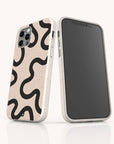 Two smartphones with Black Swirl Lines Eco-Friendly Phone Cases in beige compostable material; one displays the back’s bold black swirl design, while the other shows the front screen.